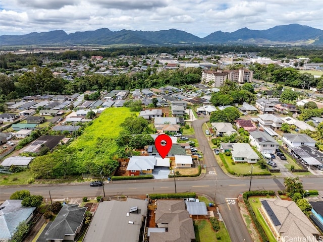 birds eye view of property featuring a mountain view