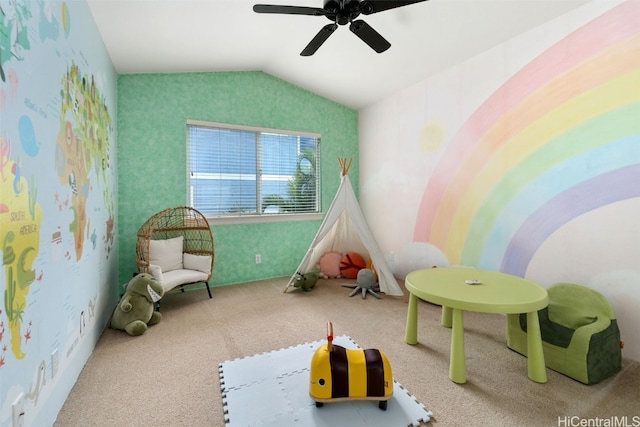 recreation room featuring carpet floors, ceiling fan, and lofted ceiling