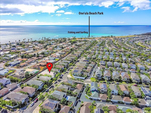 birds eye view of property with a water view and a residential view