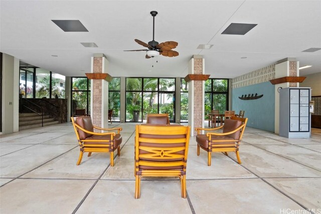 interior space with plenty of natural light and ceiling fan