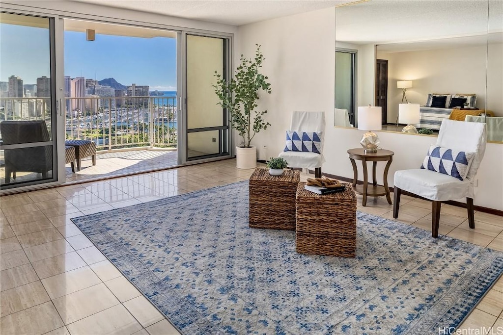 sitting room featuring light tile patterned floors