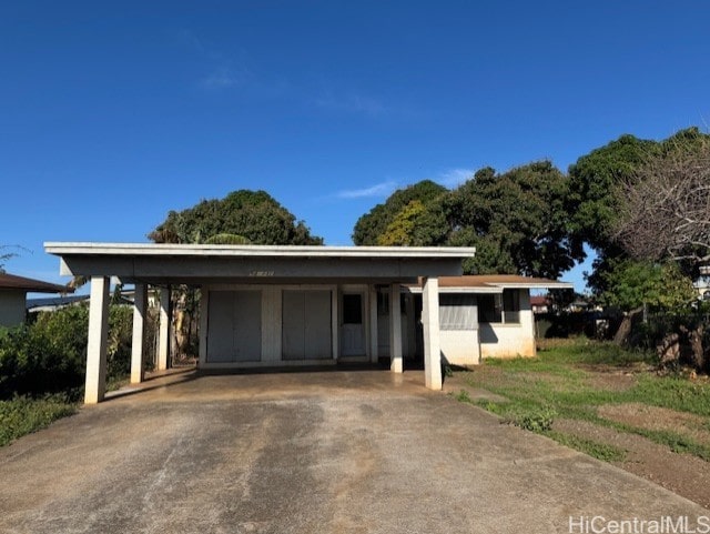 view of front of house with a carport