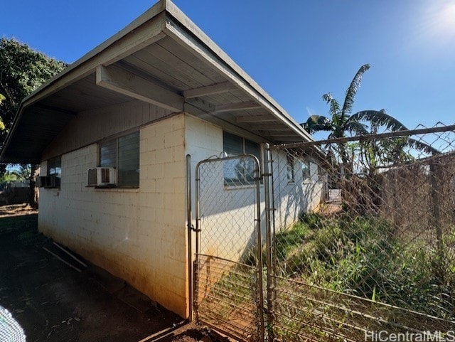 view of property exterior with cooling unit