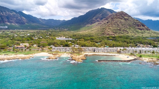 view of pool with a water and mountain view