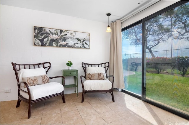 living area with light tile patterned flooring