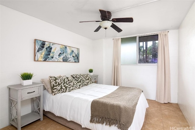 bedroom featuring light tile patterned floors and ceiling fan