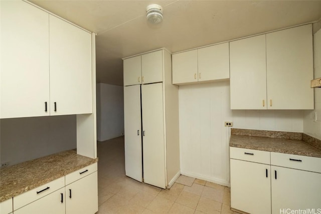 kitchen with white cabinets