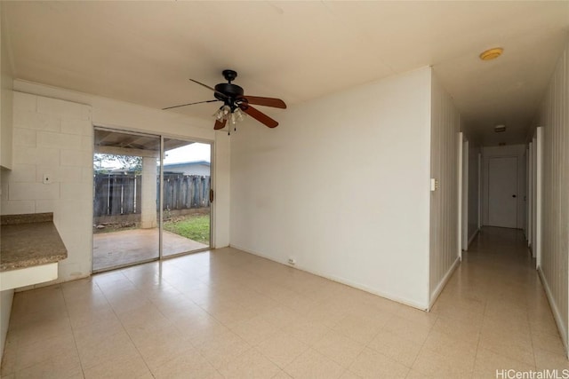 unfurnished room with ceiling fan