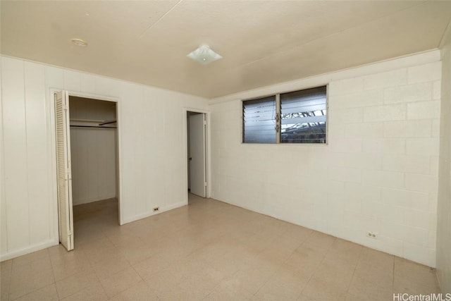 unfurnished bedroom featuring a closet