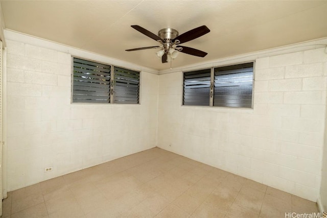 empty room featuring ceiling fan