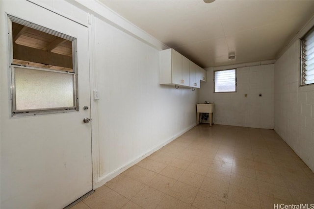 laundry area featuring cabinets and electric dryer hookup