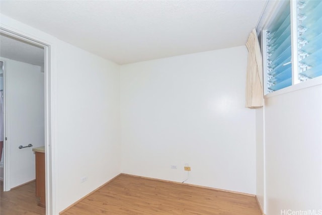 empty room featuring light wood finished floors