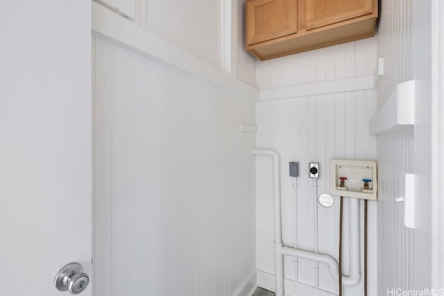 laundry area with cabinet space, electric dryer hookup, and washer hookup