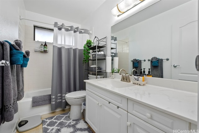 full bathroom with vanity, shower / bath combo, and toilet