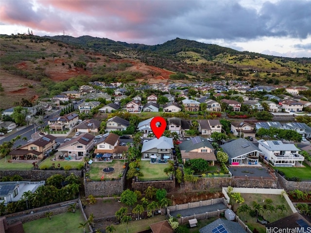 aerial view at dusk with a mountain view