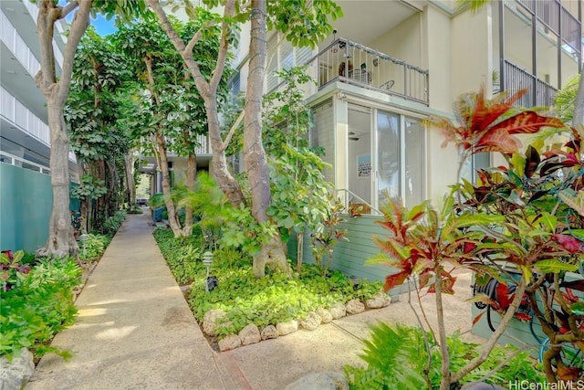 view of property exterior featuring a balcony