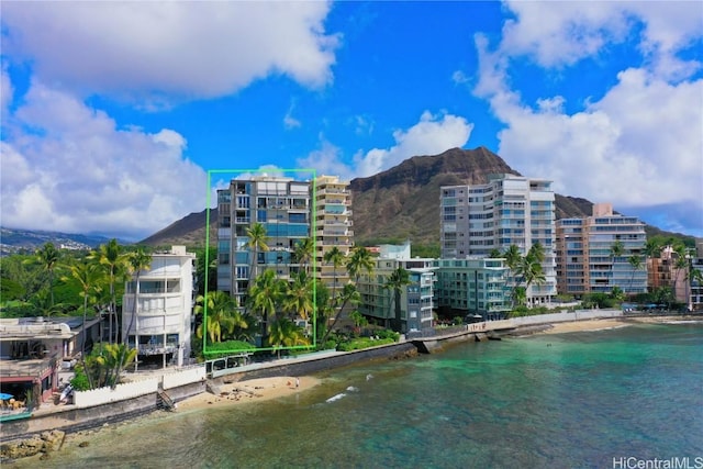 property view of water with a view of the beach and a mountain view