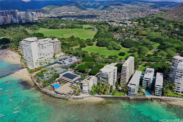 birds eye view of property featuring a city view and a water and mountain view