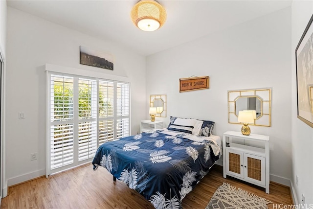 bedroom featuring wood-type flooring