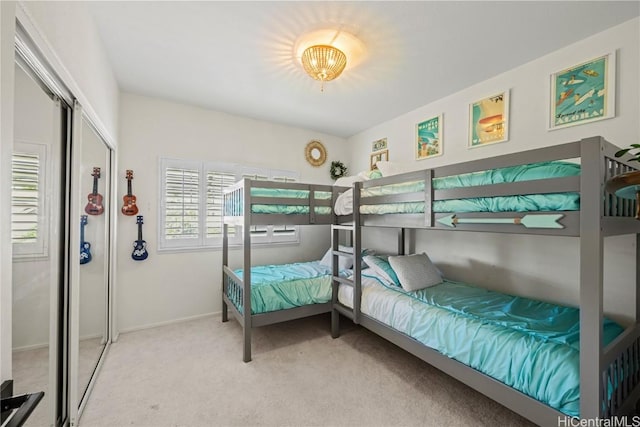 carpeted bedroom with a closet