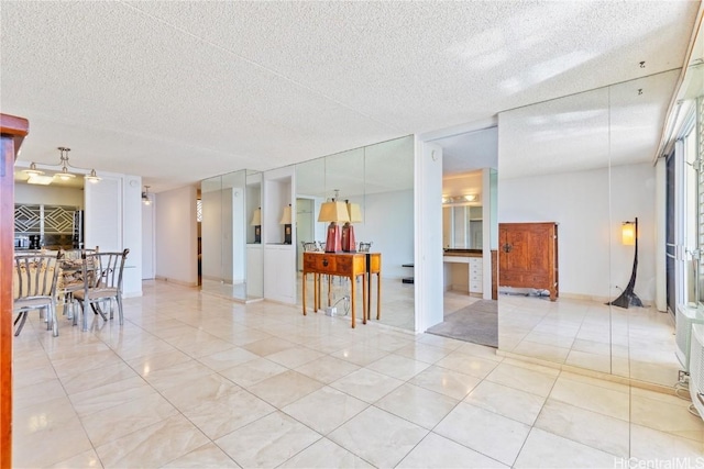 interior space featuring a textured ceiling