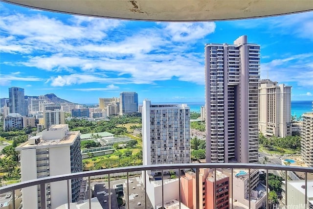 balcony featuring a water view