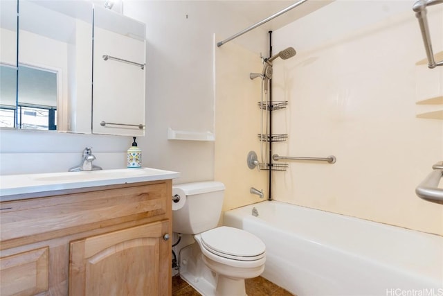 full bathroom with bathing tub / shower combination, vanity, and toilet