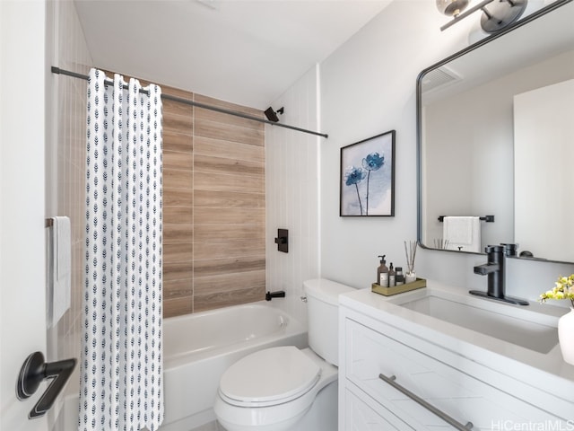 full bathroom with shower / tub combo with curtain, vanity, and toilet