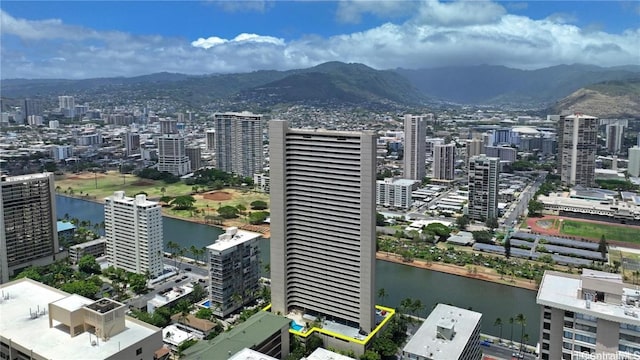 city view featuring a water and mountain view