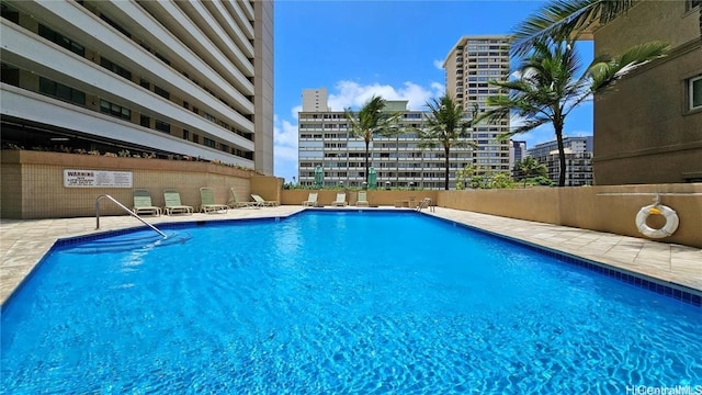 view of pool featuring a patio area