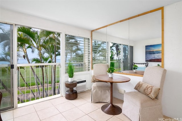 sunroom with a wall mounted AC