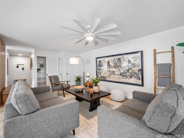 living room featuring ceiling fan