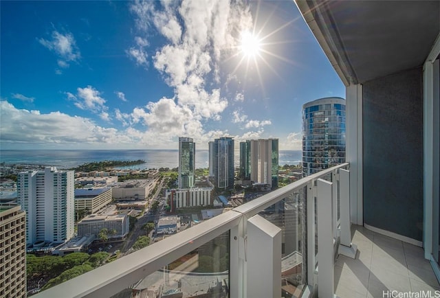 balcony featuring a water view