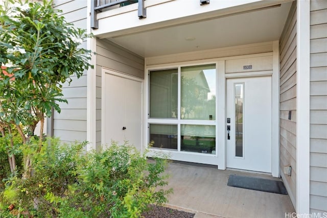 property entrance with a balcony