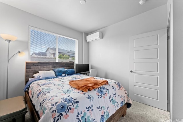 carpeted bedroom featuring a wall mounted air conditioner