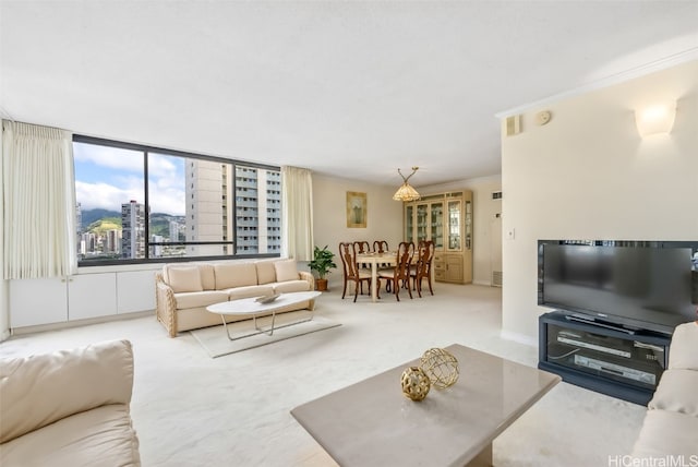 living room featuring light carpet