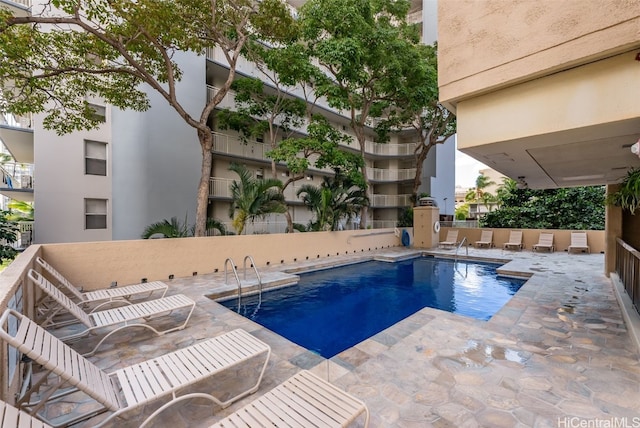 view of pool with a patio area