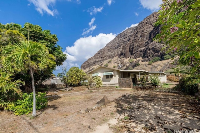 exterior space featuring a mountain view