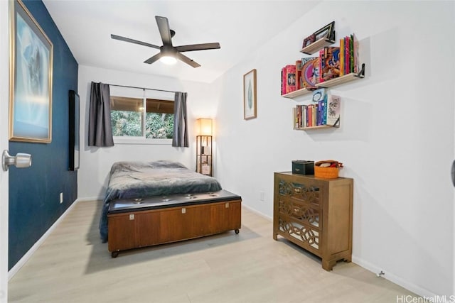 bedroom featuring ceiling fan and light wood-type flooring