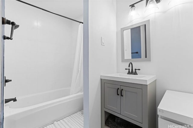 bathroom featuring vanity and shower / bathtub combination with curtain