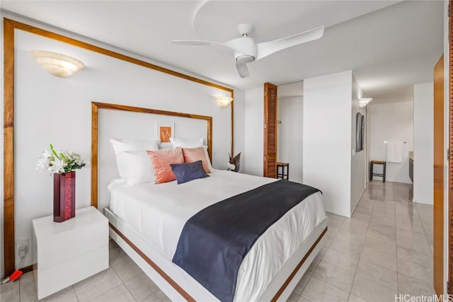 bedroom featuring ceiling fan and light tile patterned flooring