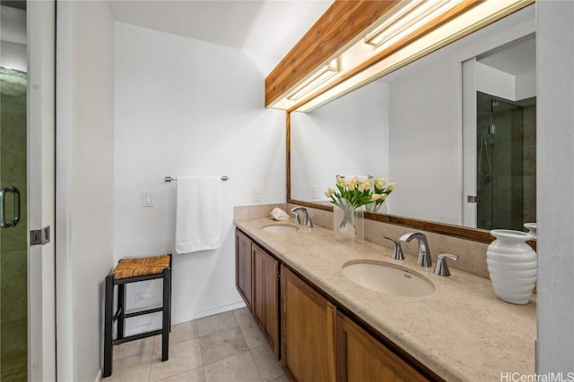 bathroom featuring vanity, tile patterned floors, and an enclosed shower