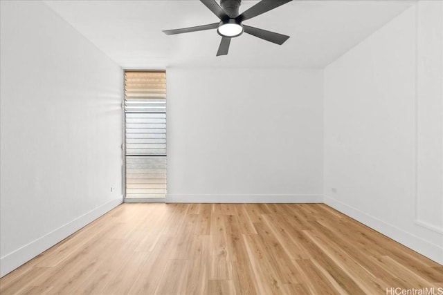 spare room with ceiling fan and light hardwood / wood-style floors