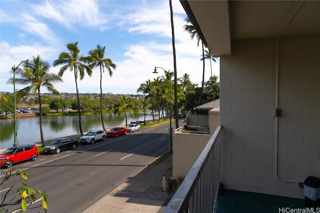 balcony featuring a water view