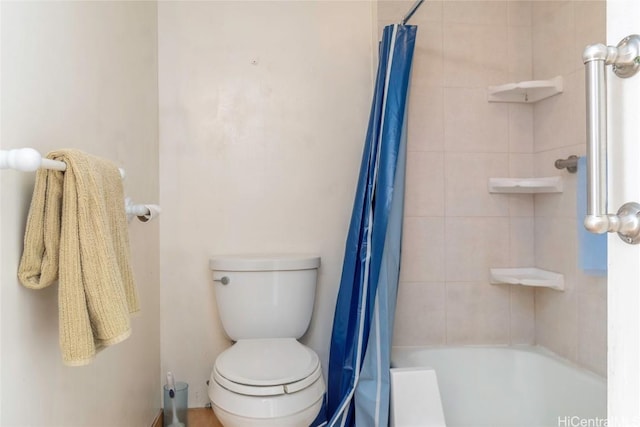 bathroom featuring toilet and shower / bathtub combination with curtain