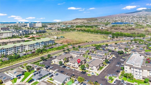 drone / aerial view featuring a mountain view