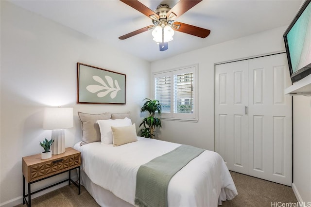 bedroom featuring carpet floors, a closet, and ceiling fan