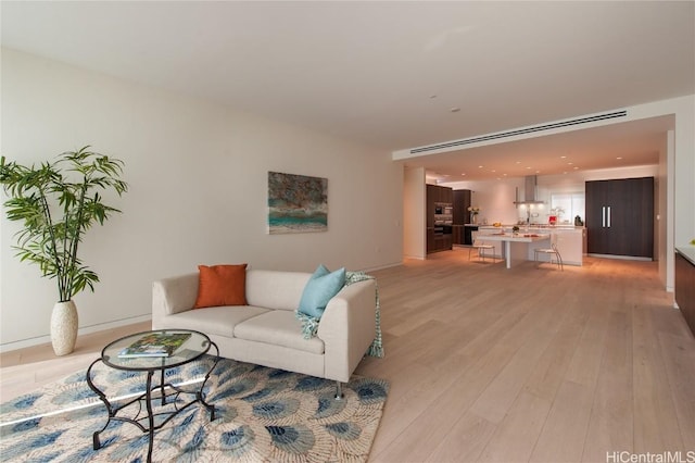 living room with light wood-type flooring