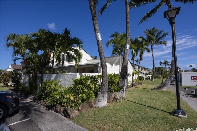 view of property exterior featuring a yard