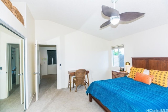 bedroom featuring light carpet and ceiling fan